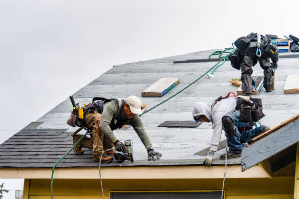 Professional Gutter Installation technician working in Mellott, IN